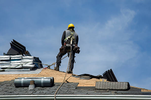 Professional Roofing technician working in Montcalm, WV